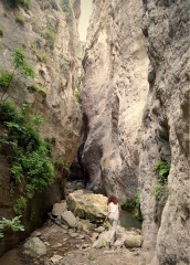 Girl clambering up Avakas gorge