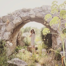 Sofie under a Roman viaduct in the ancient city of Salamis