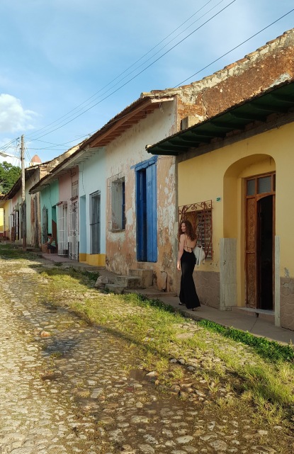 Girl walking on the streets of Trinidad Cuba