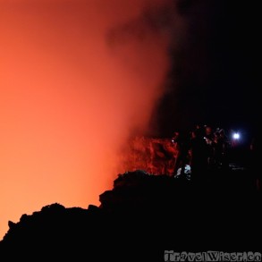 People standing on the rim of Erta Ale lava lake
